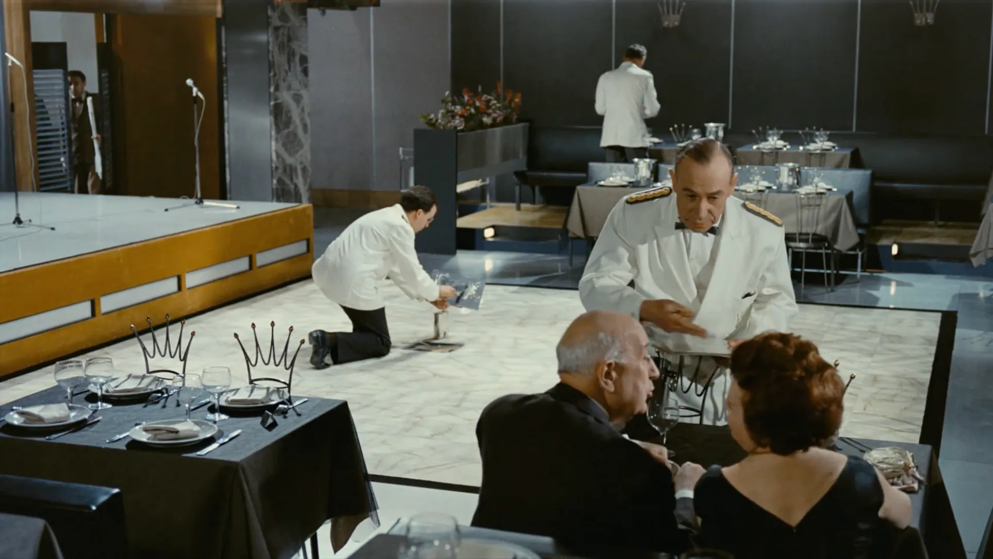 still from Playtime (1967) showing a restaurant under construction